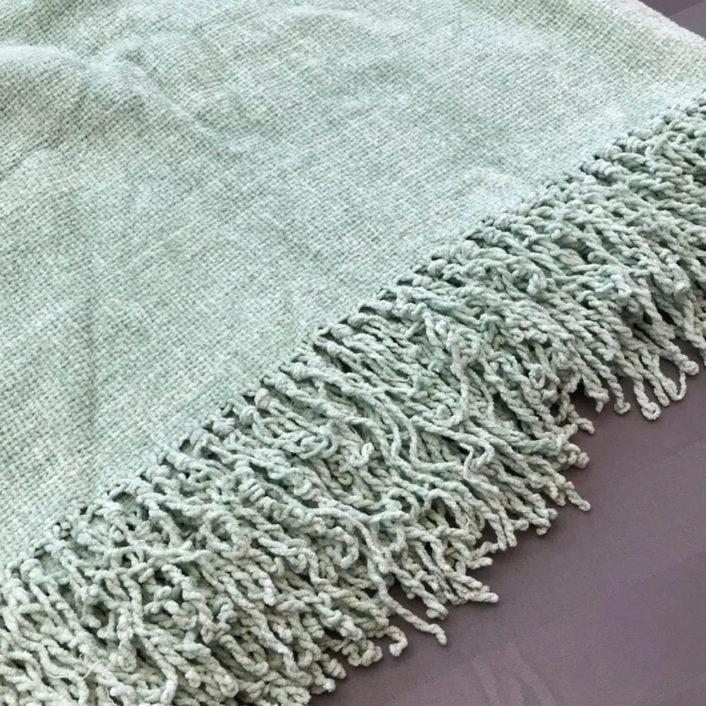 Green throw blanket